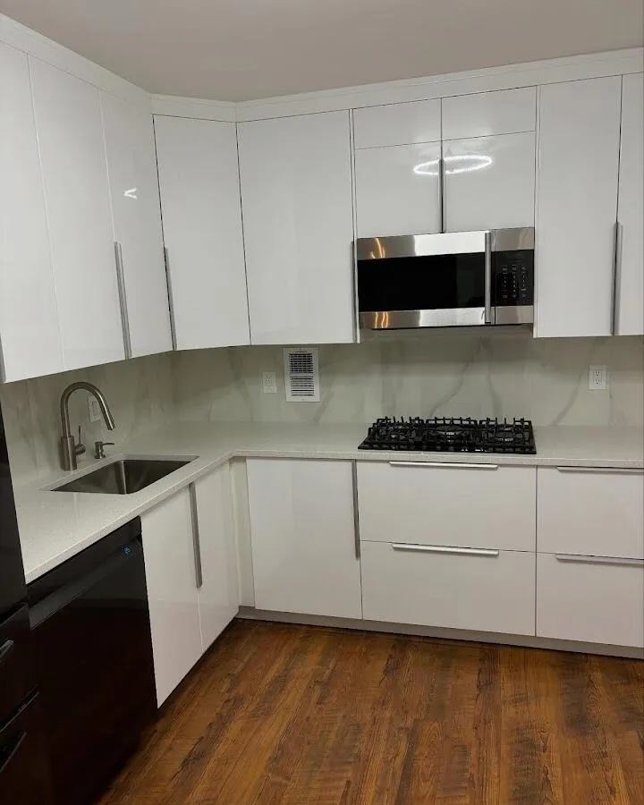 Restored kitchen with white cabinets after water damage in Albany